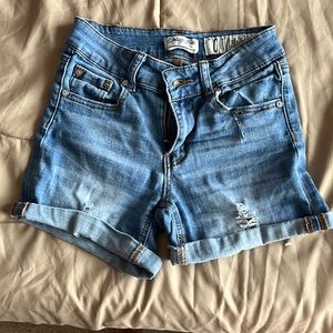 Cute light blue faded ripped shorts (size 0 junior) from Indigo Rein.